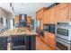 Well-equipped kitchen features a large island with bar seating and stainless steel appliances at 2901 Hazel Foster Dr, Carmel, IN 46033