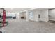Large finished basement with plush carpeting and ample space for entertaining or relaxing at 2920 Bloomsbury S, Greenwood, IN 46143