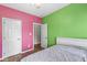 Cozy bedroom with hardwood floors, two closets, and a ceiling fan, perfect for a guest room at 2920 Bloomsbury S, Greenwood, IN 46143