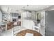 Open-concept kitchen featuring a large island, modern appliances, and seamless flow into the living area at 2920 Bloomsbury S, Greenwood, IN 46143