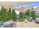 Outdoor patio shaded by an awning with a table and chairs, perfect for outdoor relaxation at 2920 Bloomsbury S, Greenwood, IN 46143