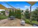Outdoor patio shaded by an awning with a table and chairs, perfect for outdoor relaxation at 2920 Bloomsbury S, Greenwood, IN 46143