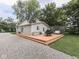 This home features a spacious deck, perfect for outdoor dining and relaxation in a private backyard setting at 3641 Harrison St, Needham, IN 46162