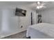Clean bedroom with a ceiling fan and a view towards another room at 3641 Harrison St, Needham, IN 46162