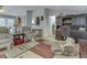 Inviting living room features cozy seating, a detailed rug, and a built-in desk area at 3641 Harrison St, Needham, IN 46162