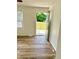 Cozy bedroom with new flooring and a sliding door to the back deck at 405 E Cowing Dr, Muncie, IN 47303