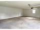 Empty garage featuring an open layout and window at 405 E Cowing Dr, Muncie, IN 47303