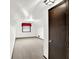 Spacious and bright attic with carpeting, natural light, and a modern ceiling fixture at 4070 Serenity Way Ct, Greenwood, IN 46142