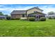 Expansive backyard with a lush lawn and mature landscaping, perfect for outdoor gatherings at 4070 Serenity Way Ct, Greenwood, IN 46142