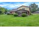 Extensive backyard with lush lawn and mature landscaping, creating a serene outdoor experience at 4070 Serenity Way Ct, Greenwood, IN 46142