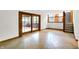 Basement area with tile flooring and sliding doors to the exterior porch at 4070 Serenity Way Ct, Greenwood, IN 46142