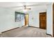Bright bedroom with plush carpeting, ceiling fan, and light blue walls at 4070 Serenity Way Ct, Greenwood, IN 46142