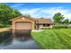 Charming single-story home featuring a brick and siding exterior with an attached two-car garage at 4070 Serenity Way Ct, Greenwood, IN 46142