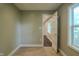 Bright bedroom showcasing natural light, neutral paint, and hardwood flooring at 4903 E Naomi St, Indianapolis, IN 46203