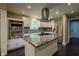 Modern kitchen featuring stainless steel appliances, granite countertops, and a stylish island at 4903 E Naomi St, Indianapolis, IN 46203