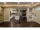 Open-concept living space with views into the kitchen at 4903 E Naomi St, Indianapolis, IN 46203