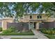 Inviting townhome featuring a well-maintained front yard and a charming fence at 5152 Coppertree Ln, Avon, IN 46123