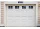 A white garage door with square windows above with the house address is visible at 5152 Coppertree Ln, Avon, IN 46123