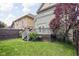 Backyard view featuring a well-maintained lawn and outdoor living area at 519 Sutherland Ave, Indianapolis, IN 46205