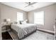 Cozy bedroom featuring a comfortable bed, neutral color scheme, and decorative rug at 519 Sutherland Ave, Indianapolis, IN 46205