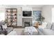 Cozy living room with fireplace, television, and comfortable seating arrangement at 519 Sutherland Ave, Indianapolis, IN 46205