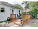 Back deck with outdoor seating and string lights overhead, perfect for entertaining at 5363 Primrose Ave, Indianapolis, IN 46220