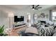 Bright living room with hardwood floors, fireplace and stylish furniture at 5363 Primrose Ave, Indianapolis, IN 46220