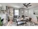 Inviting living room with a large sofa, modern décor, and lots of natural light at 5363 Primrose Ave, Indianapolis, IN 46220