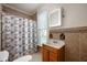 Bright bathroom with a sink vanity, LED medicine cabinet, shower and bathtub at 5396 N 1000 E, Sheridan, IN 46069