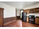Open kitchen featuring wood cabinets, modern appliances, and hardwood floors at 5396 N 1000 E, Sheridan, IN 46069