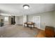 Spacious living room featuring neutral paint, carpet flooring, and natural light at 5396 N 1000 E, Sheridan, IN 46069