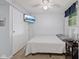 Bright bedroom with a comfortable bed, closet, and a ceiling fan at 618 Shady Creek Dr, Greenwood, IN 46142