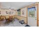 Dining room with ceiling fan, wallpaper trim, and view to the backyard at 618 Shady Creek Dr, Greenwood, IN 46142