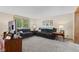 Spacious living room featuring two couches, neutral walls, and large windows at 618 Shady Creek Dr, Greenwood, IN 46142