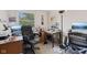 Bright home office features a large window, neutral walls, and carpeting at 618 Shady Creek Dr, Greenwood, IN 46142