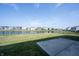 Spacious backyard with an iron fence providing serene pond views at 6218 N Woodside Ct, McCordsville, IN 46055