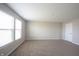 This is a bedroom with carpet flooring, neutral walls, and window at 6218 N Woodside Ct, McCordsville, IN 46055