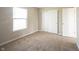 Bedroom with neutral carpet, natural light and a closet with sliding doors at 6218 N Woodside Ct, McCordsville, IN 46055