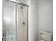 Modern bathroom features a glass shower door, towel rack, and toilet at 6316 Harmonridge Ct, Indianapolis, IN 46278