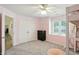 Pink-walled bedroom with carpet, a bunk, and closet at 6316 Harmonridge Ct, Indianapolis, IN 46278