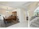Traditional dining room adjacent to a living room at 6316 Harmonridge Ct, Indianapolis, IN 46278