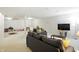Spacious living room with comfortable seating and TV, plus an adjacent playroom area at 6316 Harmonridge Ct, Indianapolis, IN 46278