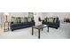 Spacious living area with comfortable seating and a center coffee table for relaxation at 6316 Harmonridge Ct, Indianapolis, IN 46278