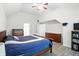 The main bedroom boasts a vaulted ceiling, hardwood floors, and ample dresser storage at 6316 Harmonridge Ct, Indianapolis, IN 46278