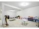 Bright playroom with ample space for play, featuring organized storage and play furniture at 6316 Harmonridge Ct, Indianapolis, IN 46278