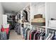 Spacious walk-in closet featuring custom shelving and ample storage space for clothes and accessories at 6316 Harmonridge Ct, Indianapolis, IN 46278