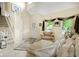 Comfortable living area with tall ceilings, tile floors, and ample natural light at 6439 Bower Dr, Indianapolis, IN 46241