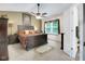 Spacious primary bedroom features a ceiling fan, neutral colors, and a large window at 6439 Bower Dr, Indianapolis, IN 46241