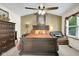 Spacious primary bedroom features a ceiling fan, neutral colors, and lots of storage at 6439 Bower Dr, Indianapolis, IN 46241