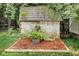 Backyard shed surrounded by greenery and mulch, providing practical storage with a touch of charm at 6439 Bower Dr, Indianapolis, IN 46241